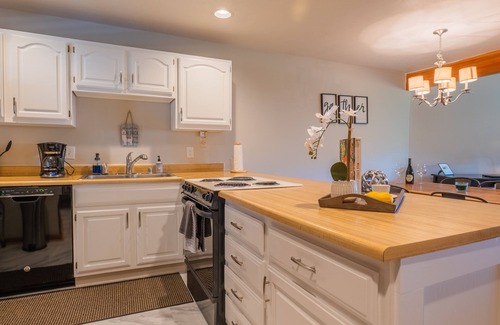 Wildernest Condo | Great views, cozy feel, central to outdoor activities, and relaxing hot tub/pool