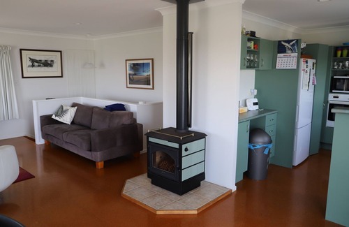 Opito Bay House | Great views, great family bach, super close to the beach and a spa pool!