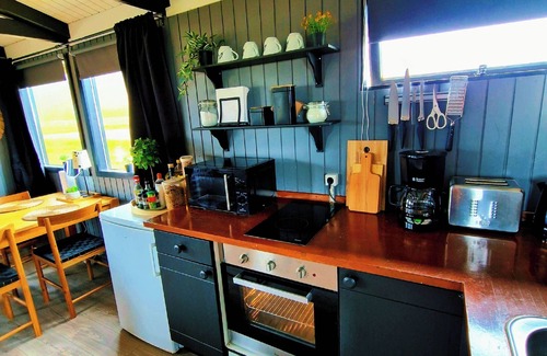 Storidalur Cabin | Green Farm Stay with private hot tub and Northern Lights Viewpoint.