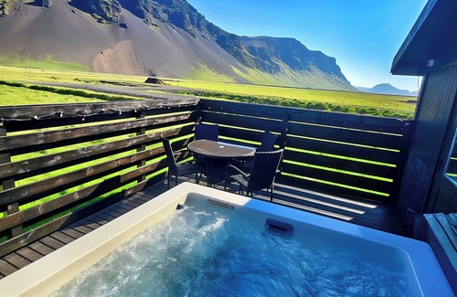 Storidalur Cabin | Green Farm Stay with private hot tub and Northern Lights Viewpoint.