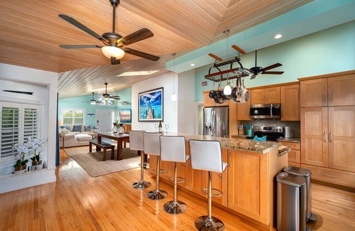 Sugarloaf Shores House | Green Turtle Oasis: Lovely 4BR Canal Front Home, Pool, Dockage, Tiki, Outdoor Dining & Pet Friendly!