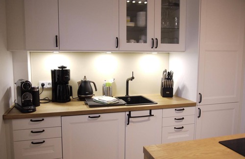 Haffkrug Apartment | Großzügige Wohnung auf 125qm mit Terrasse, Wintergarten, Sauna und Kamin