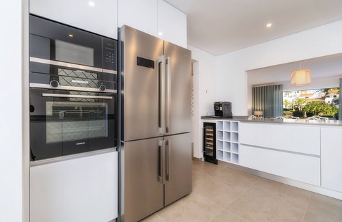 Almancil Apartment | Ground Floor Apartment in Lakeside Village overlooking lake, pool and gardens.