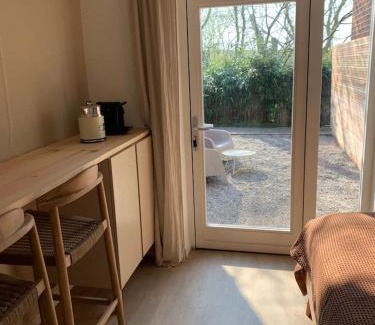 Municipality of Texel Bed & Breakfast | Guest room with terrace at the Wadden Sea