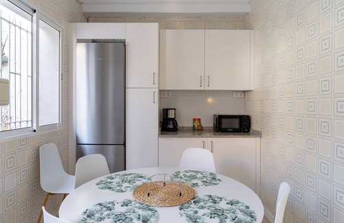 Playas del Palo Apartment | GuestReady - Terrace Malaga view