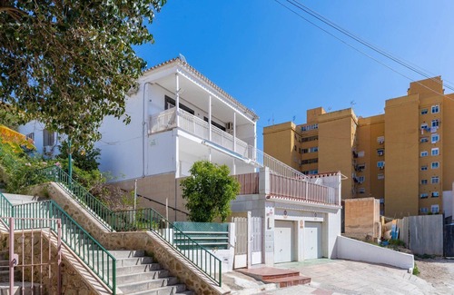 Playas del Palo Apartment | GuestReady - Terrace Malaga view
