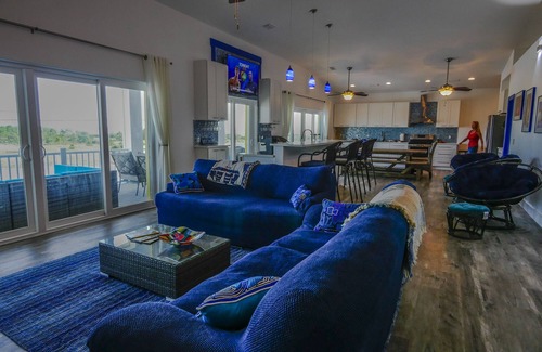 Navarre Beach House | Gulf and Sound Views! HUGE backyard, 33' POOL,Hot Tub, Outdoor Bar and TVs