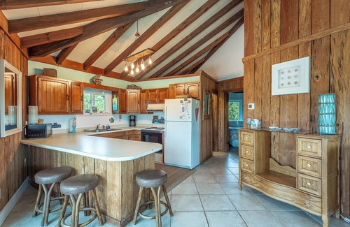 Sea Palm Village House | Gulf Views. Steps to beach and pool. Pets ok. Beautiful, lush property.