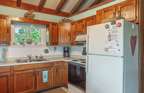 Sea Palm Village House | Gulf Views. Steps to beach and pool. Pets ok. Beautiful, lush property.