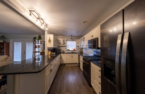 Wright House | Gulfside Allure: Stylish Decor, Large Yard, Ample Parking