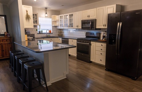 Wright House | Gulfside Allure: Stylish Decor, Large Yard, Ample Parking