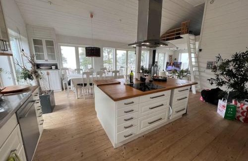 Dalaro Villa | Härlig Skärgårdsvilla med strålande sjöutsikt