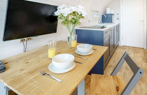 Whitland Cottage | Hand picked for its stunning countryside views and private Scandinavian log fired hot tub.