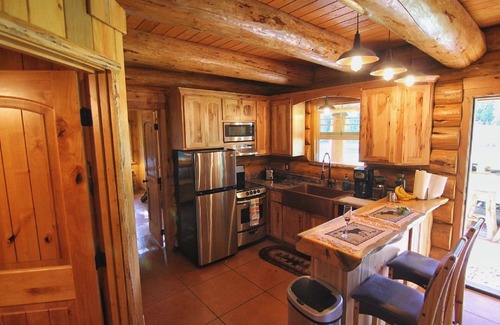 Sinclair Cabin | Handcrafted Riverfront Log Cabin