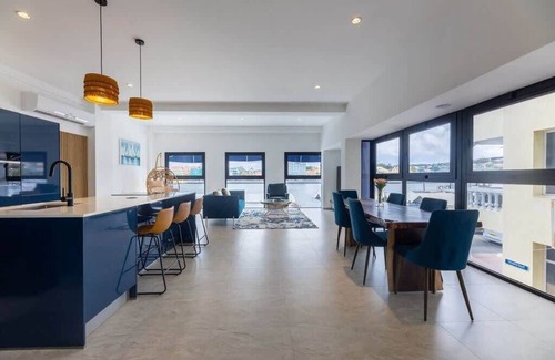 Pietermaai District Apartment | Handelskade's Grand Historical Penthouse: Refined Luxury Living