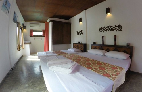 Dhiffushi House | Happy Life Maldives! ‘No news – No shoes’ feeling guaranteed.