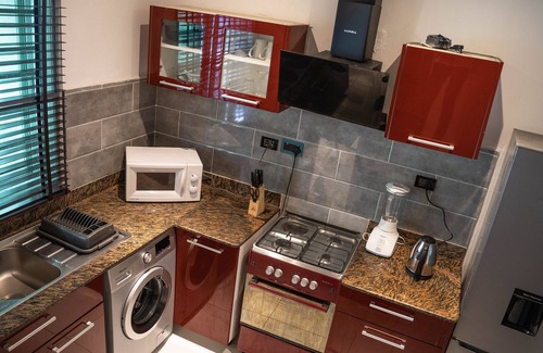 Ofin Condo | Harmony Homes: Two-Bedroom Apartment Terrace