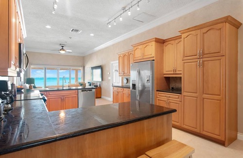 Rokers Point House | Hart House, vast patio with hot tub, heated pool & outdoor bar on Flamingo Bay