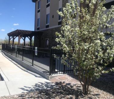 Wheatland Hotel | Heartland Inn and Suites