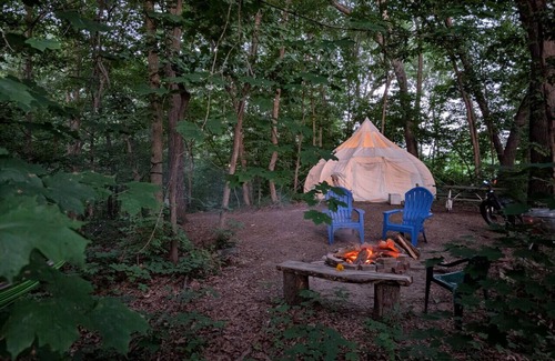 Kasbeer RV Rental | Heated Tent, Queen Bed in Forest on Farm w Animals