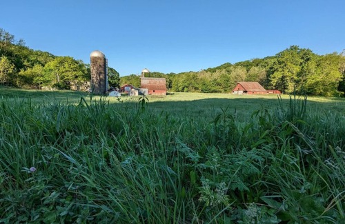 Kasbeer RV Rental | Heated Tent, Queen Bed in Forest on Farm w Animals