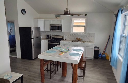 Spanish Wells House | Hidden Treasures in Poly Bay, Gorgeous Brand new Waterfront Condos