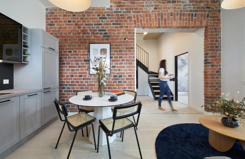 Tondi Apartment | High ceiling loft with its own backyard and a terrace