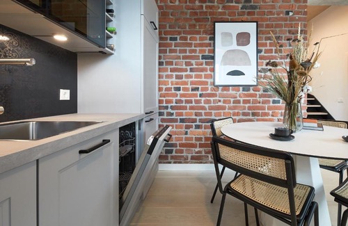 Tondi Apartment | High ceiling loft with its own backyard and a terrace