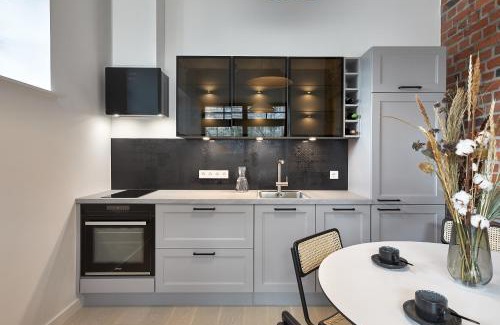 Tondi Apartment | High ceiling loft with its own backyard and a terrace