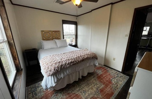 Caldwell House | Hilltop Cottage with Sunset Views at The Farm on a Hill