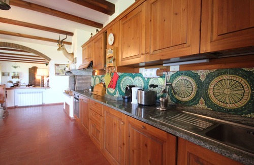 Magliano in Toscana Villa | Hilltop farmhouse with pool and sea view