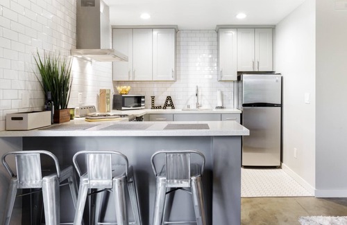 Mid City House | Hip, Loft-Style Guest Suite with Meticulous Custom Design