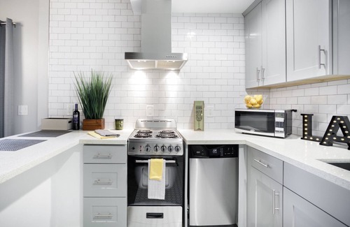 Mid City House | Hip, Loft-Style Guest Suite with Meticulous Custom Design