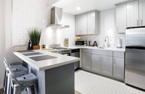 Mid City House | Hip, Loft-Style Guest Suite with Meticulous Custom Design