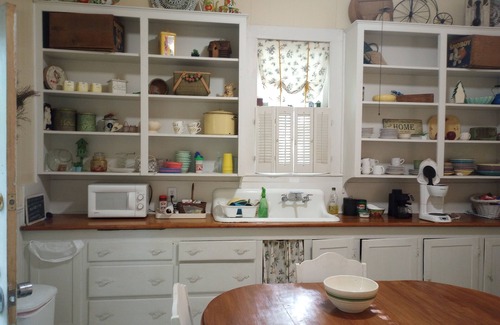 Bonham House | Historic Cottage with Backyard Pond