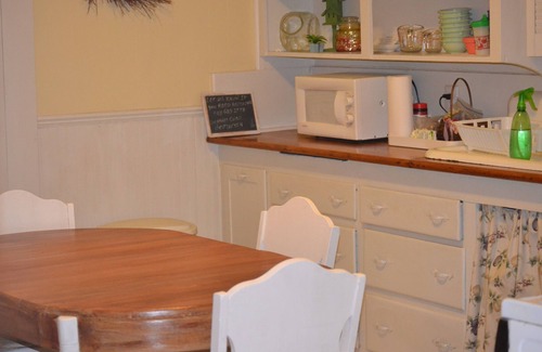 Bonham House | Historic Cottage with Backyard Pond