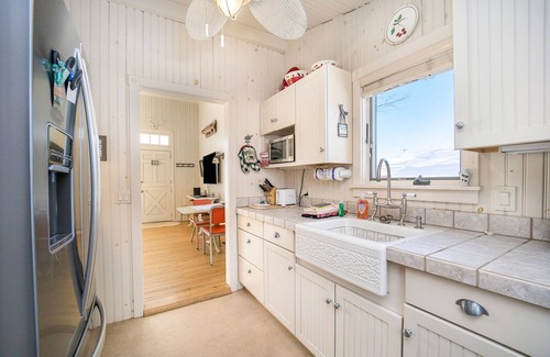 Walloon Lake House | Historic cozy cottage in Walloon Lake village close to Boyne Mountain skiing!