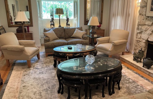 Mid City House | Historic Hollywood Haven in LA with Lush Garden, Balconies & Star-Studded Past