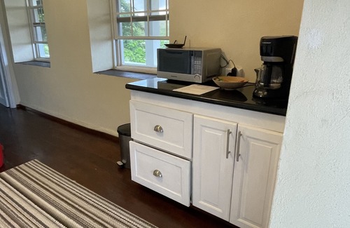 Gibbs Bay Apartment | Historic sea view 1 bed apartment in restored stone house