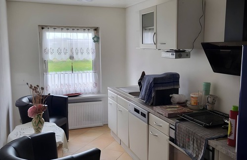 Bugewitz Apartment | Holiday Apartment '1' with Shared Terrace, Shared Garden and Wi-Fi
