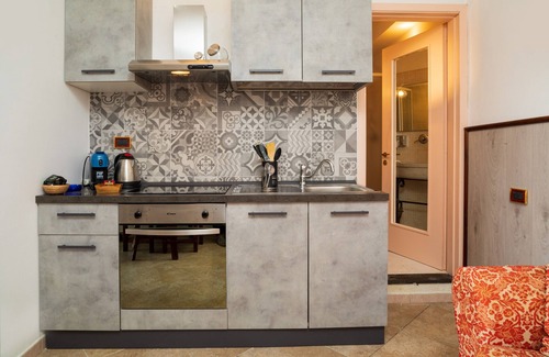 Castelmola Apartment | Holiday Apartment 'Garden Cottage I Dammusi - Limoni' with Mountain View, Shared Pool & Wi-Fi
