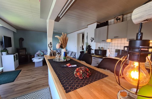 Berlar Apartment | Holiday Apartment Gartenblick 50sqm with Terrace, Garden, Fireplace and Open Kitchen with Counter