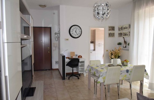 Albate Apartment | Holiday Apartment 'Serena' with Garden, Terrace & Wi-Fi
