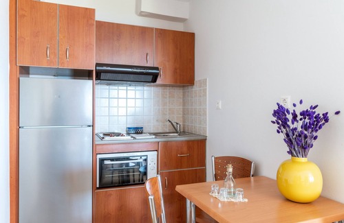 Agios Ioannis House | Holiday Home 'Anemologio 202 Studio Tinos' with Sea View, Wi-Fi and Air Conditioning