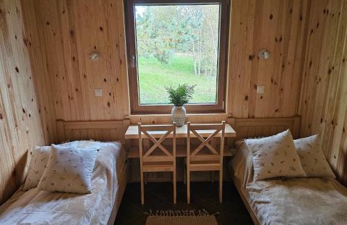 Szczecinek House | Holiday Home by Lake Wierzchowo with Boats