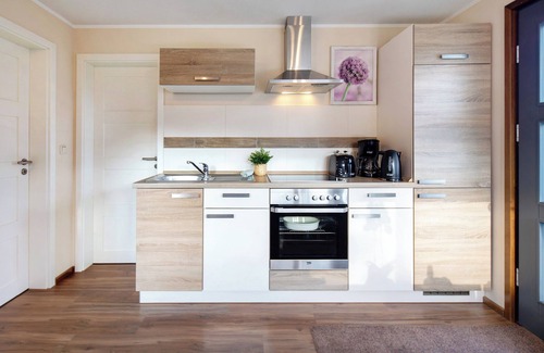 Craula House | Holiday Home 'Ferienhaus Rot' with Private Terrace, Private Garden and Wi-Fi