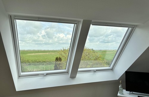 Pilsum House | Holiday Home 'Dinas Huus' with Private Terrace, Private Garden and Wi-Fi