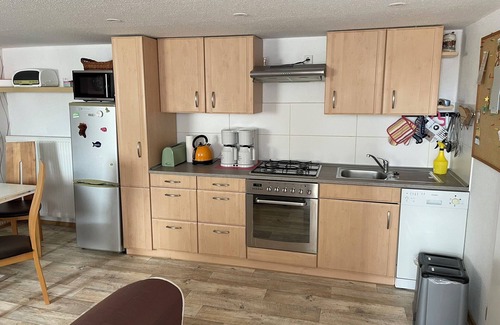 Neuruppin House | Holiday Home 'Ferienwohnung Neuruppin' with Private Terrace and Wi-Fi
