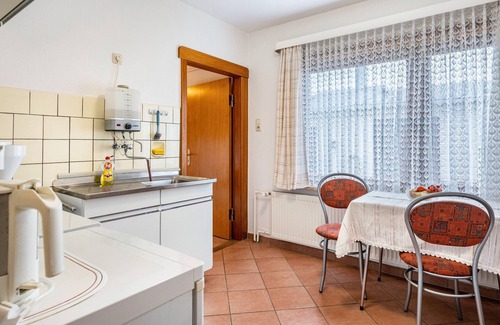 Wesselburen House | Holiday Home 'Haus Lahrsen' with Private Terrace, Shared Garden and Wi-Fi