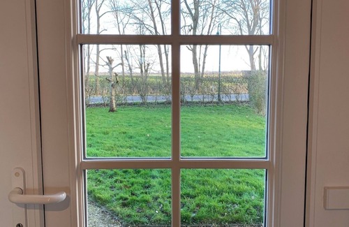 Norddeich House | Holiday Home 'Immerlicht Norddeich S-H' with Private Terrace, Private Garden and Wi-Fi